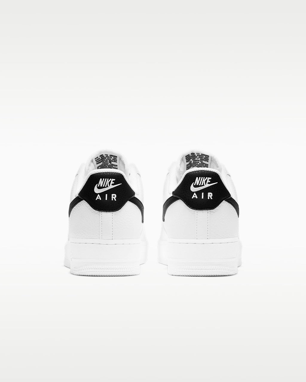 Nike Air Force 1 '07 White Pebbled Leather Black Swoosh Sneakers