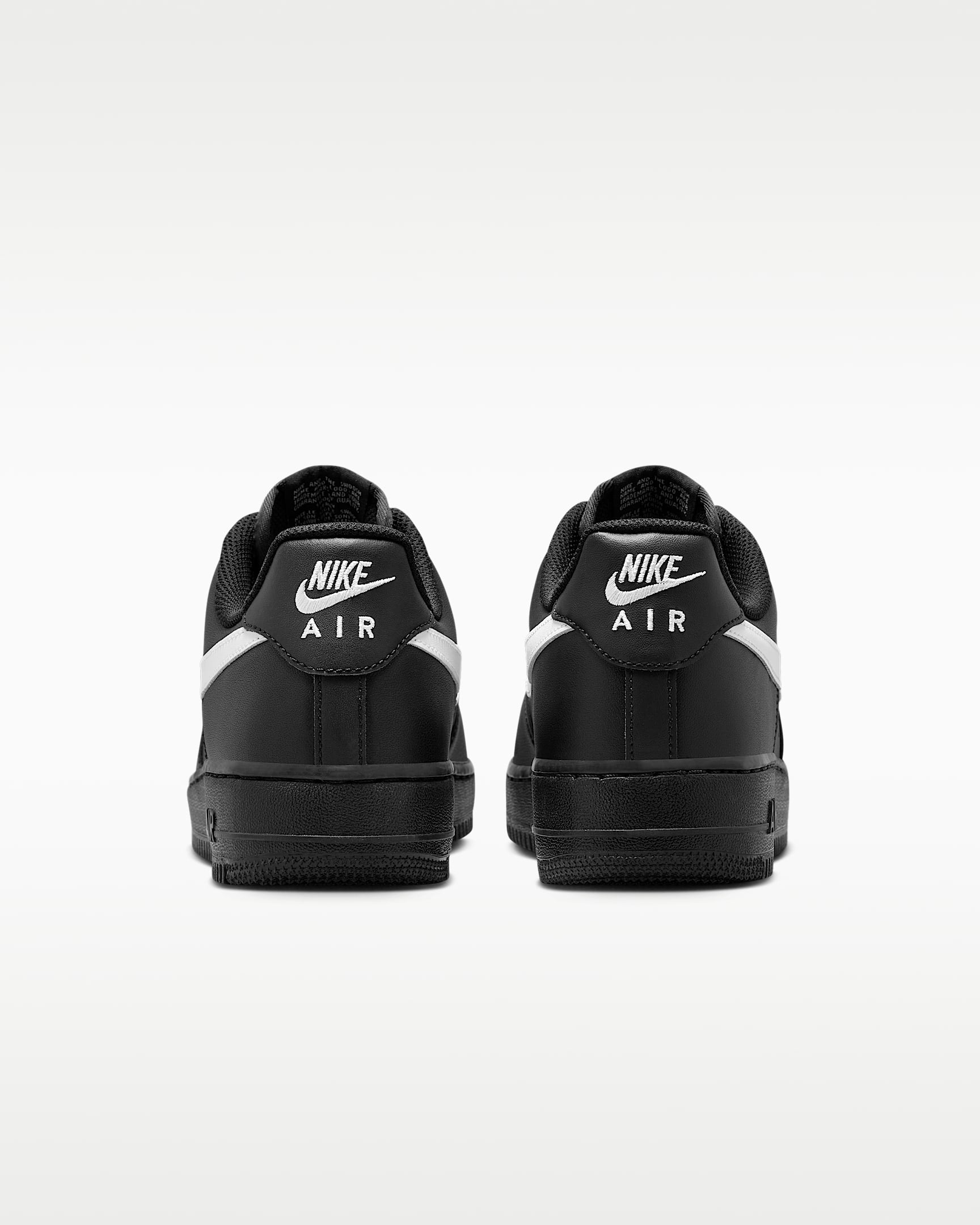 Nike Air Force 1 '07 Black Leather White Swoosh Sneakers