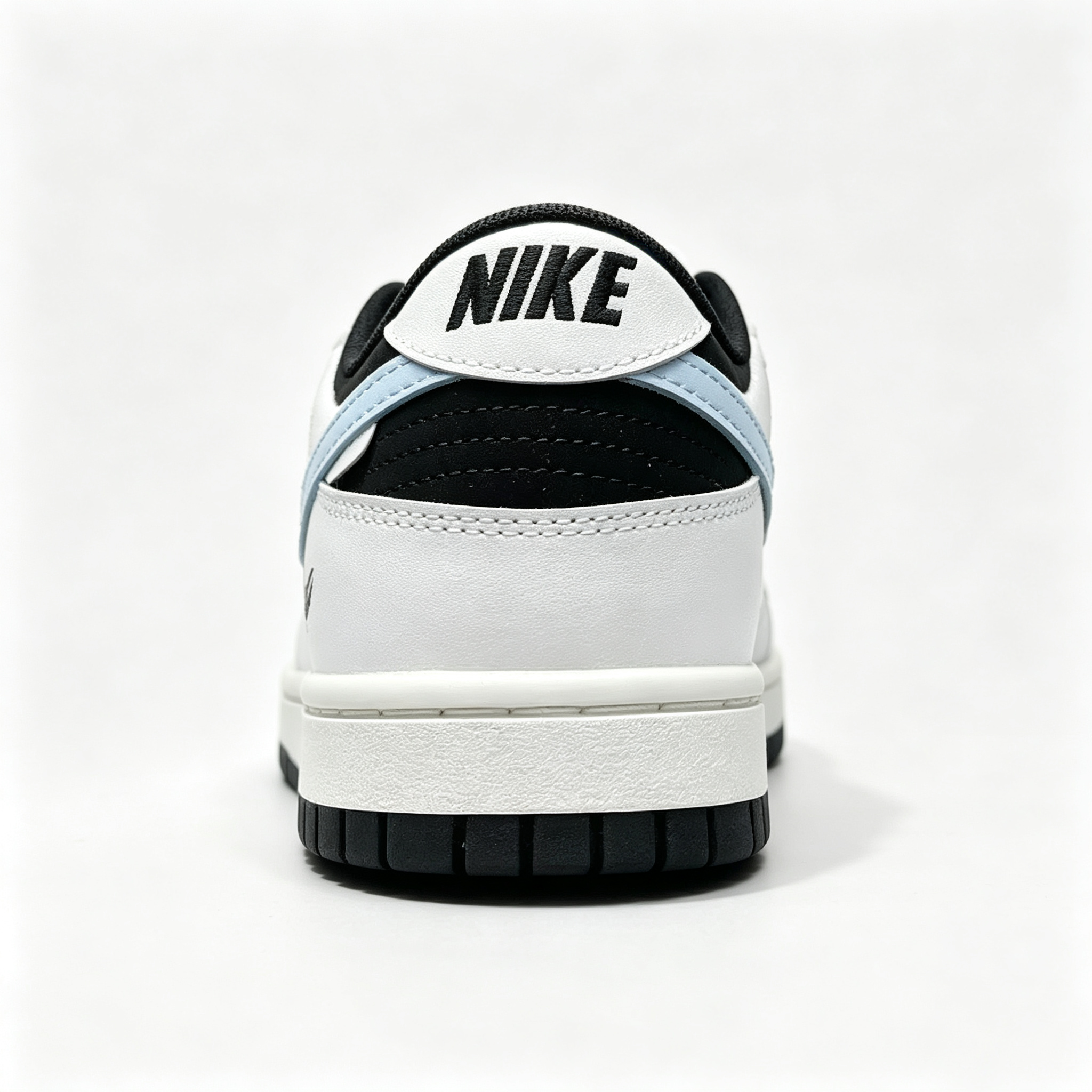 Nike Dunk Low 'Miracle' — Black & White with Light Blue Swoosh & Heel Print